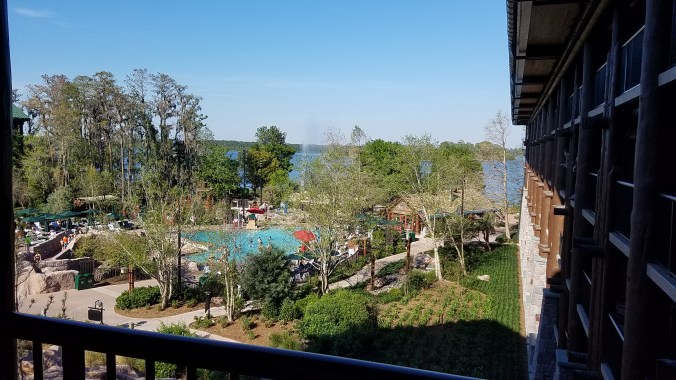 Wilderness Lodge pool and Fire Rock Geyser
